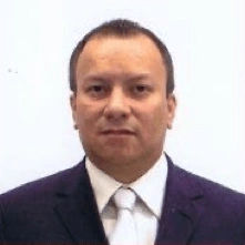 best-bail-bonds-man-miami-broward-palm-beach Portrait image of Bill from Bill Bail Bonds. Bill is wearing a navy blue business suit, white collar shirt, and a silver tie.